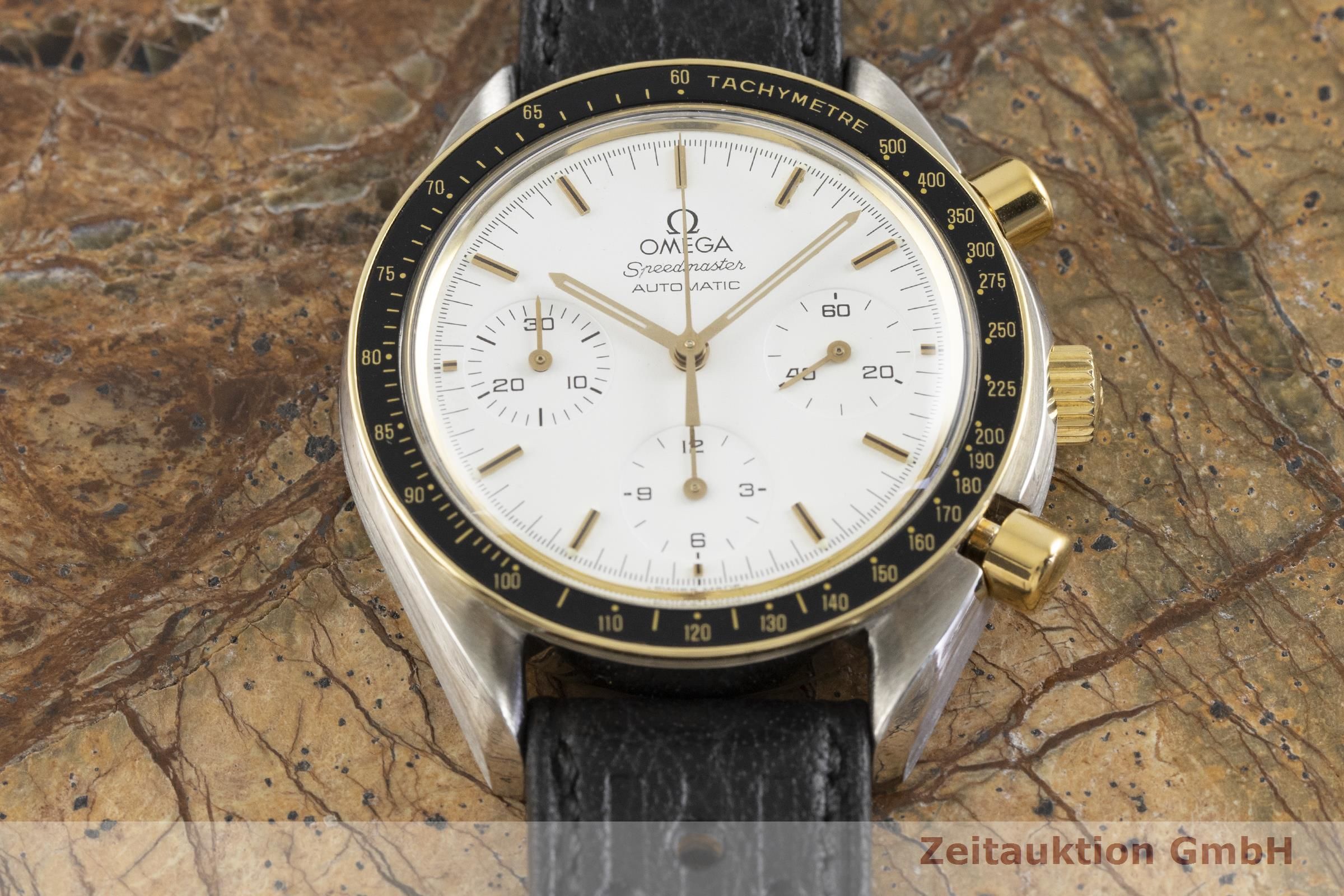 omega speedmaster automatic gold