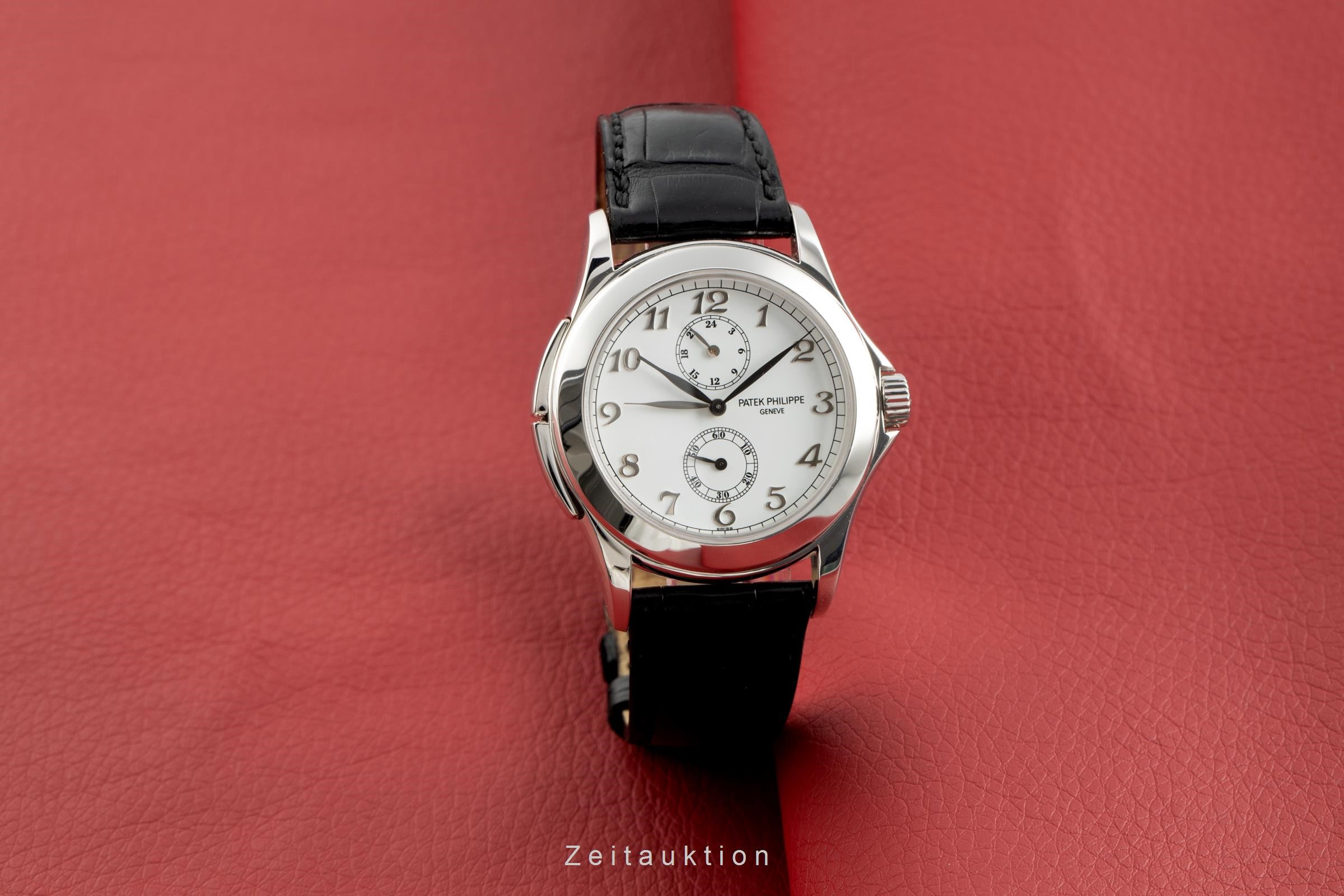 Patek Philippe Travel Time or blanc 18 ct à remontage manuel Kal. 215/156 Ref. 5134  | Zeitauktion