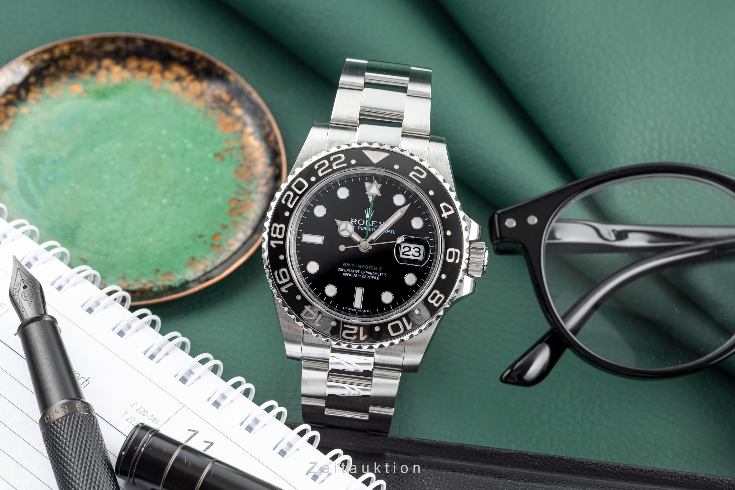 Rolex GMT-Master II Stahl Automatik Kal. 3186 Ref. 116710LN  | Zeitauktion