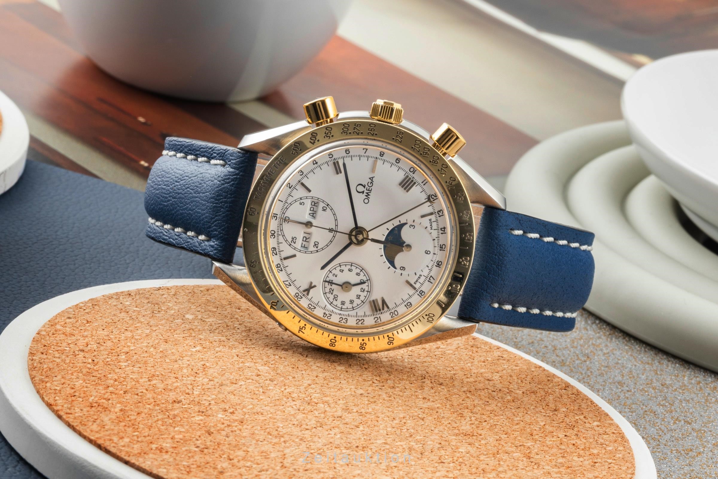 Omega Speedmaster chronograph steel / gold automatic Kal. 1150 Ref. 3330.20.00  | Zeitauktion