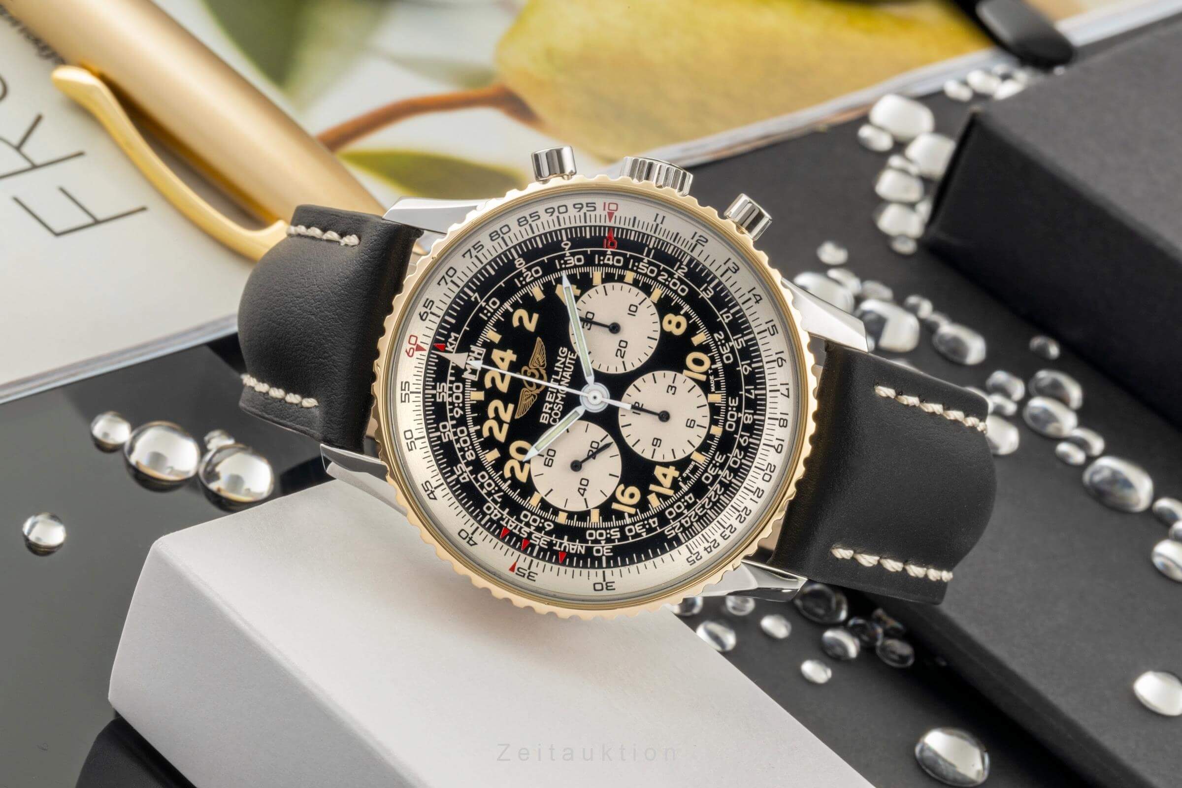 Breitling Navitimer Cosmonaute cronografo acciaio / oro carica manuale Kal. B12 Ref. B12019, 81600  | Zeitauktion