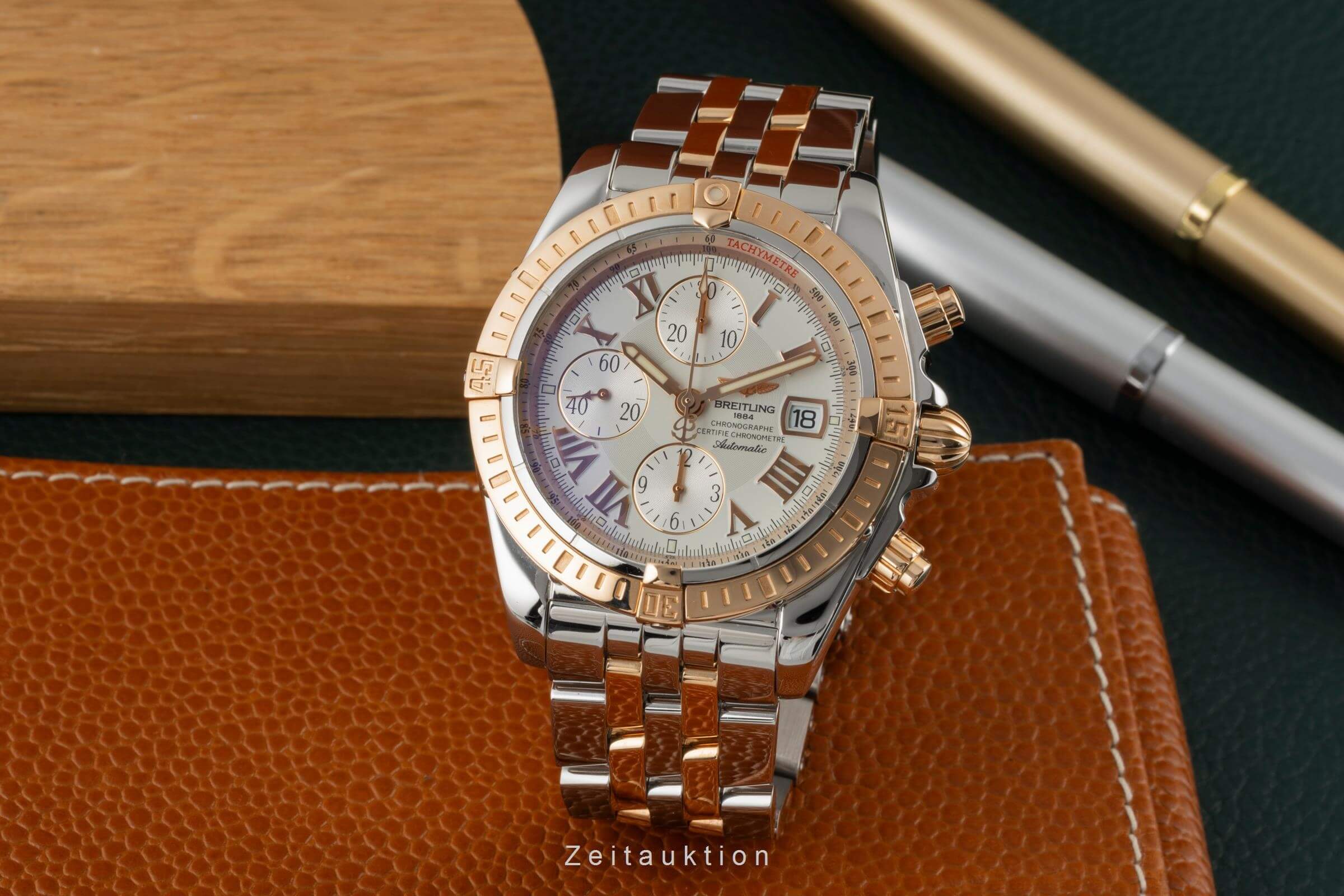 Breitling Evolution Chronograph Stahl / Gold Automatik Kal. B13 Ref. C13356  | Zeitauktion