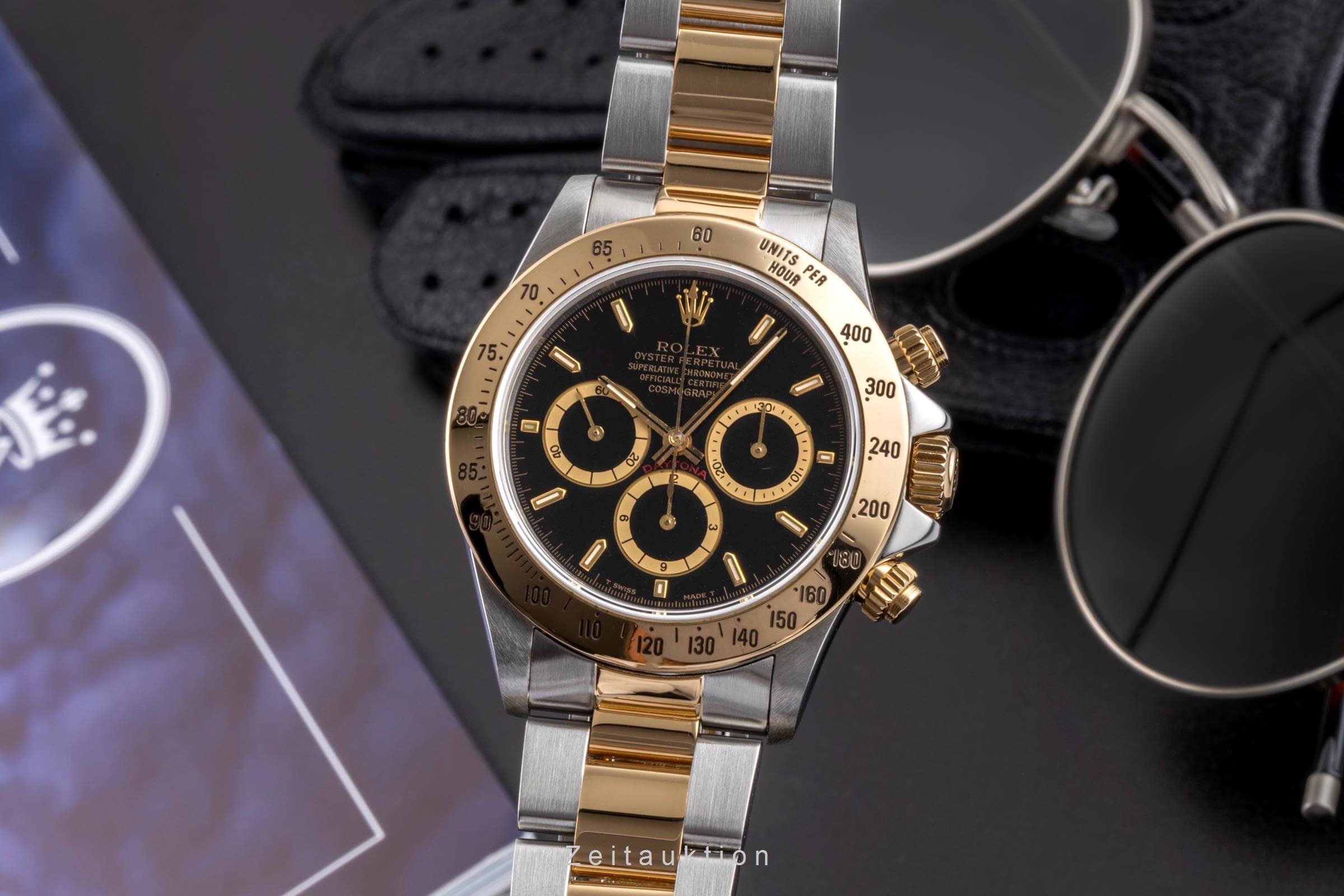 Rolex Daytona chronograph steel / gold automatic Kal. 4030 Ref. 16523  | Zeitauktion