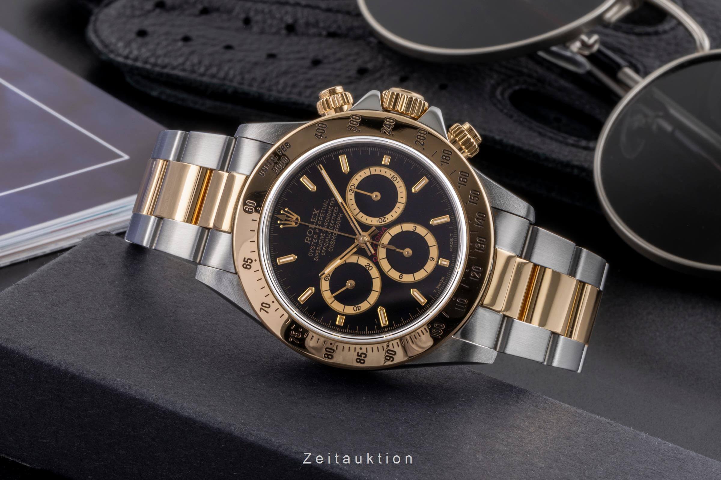 Rolex Daytona chronograph steel / gold automatic Kal. 4030 Ref. 16523  | Zeitauktion