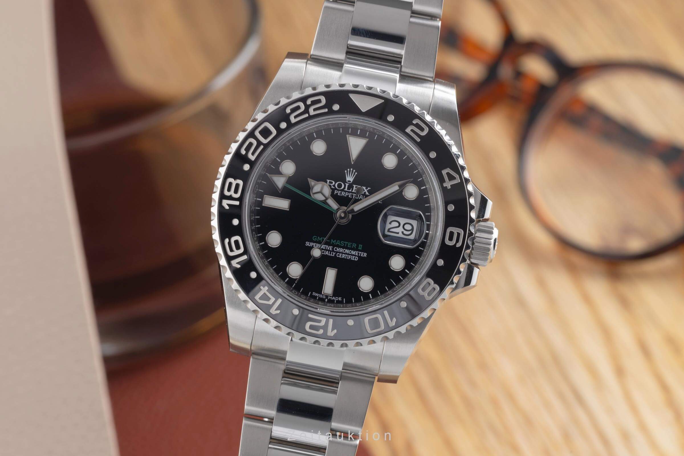 Rolex GMT-Master II Stahl Automatik Kal. 3186 Ref. 116710LN  | Zeitauktion
