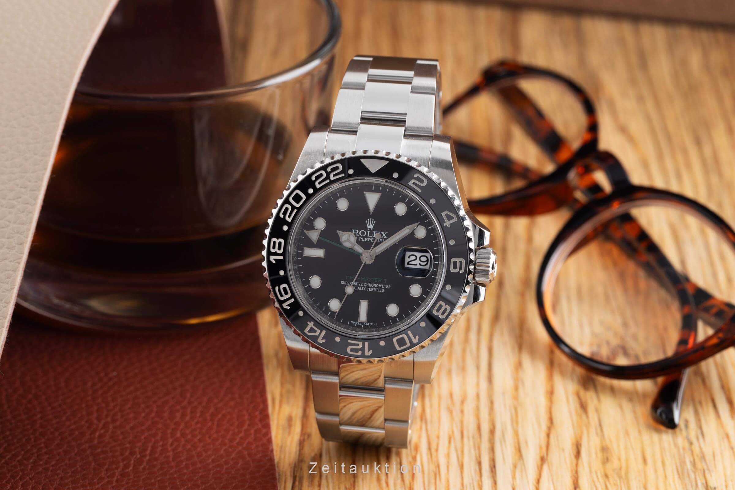 Rolex GMT-Master II Stahl Automatik Kal. 3186 Ref. 116710LN  | Zeitauktion