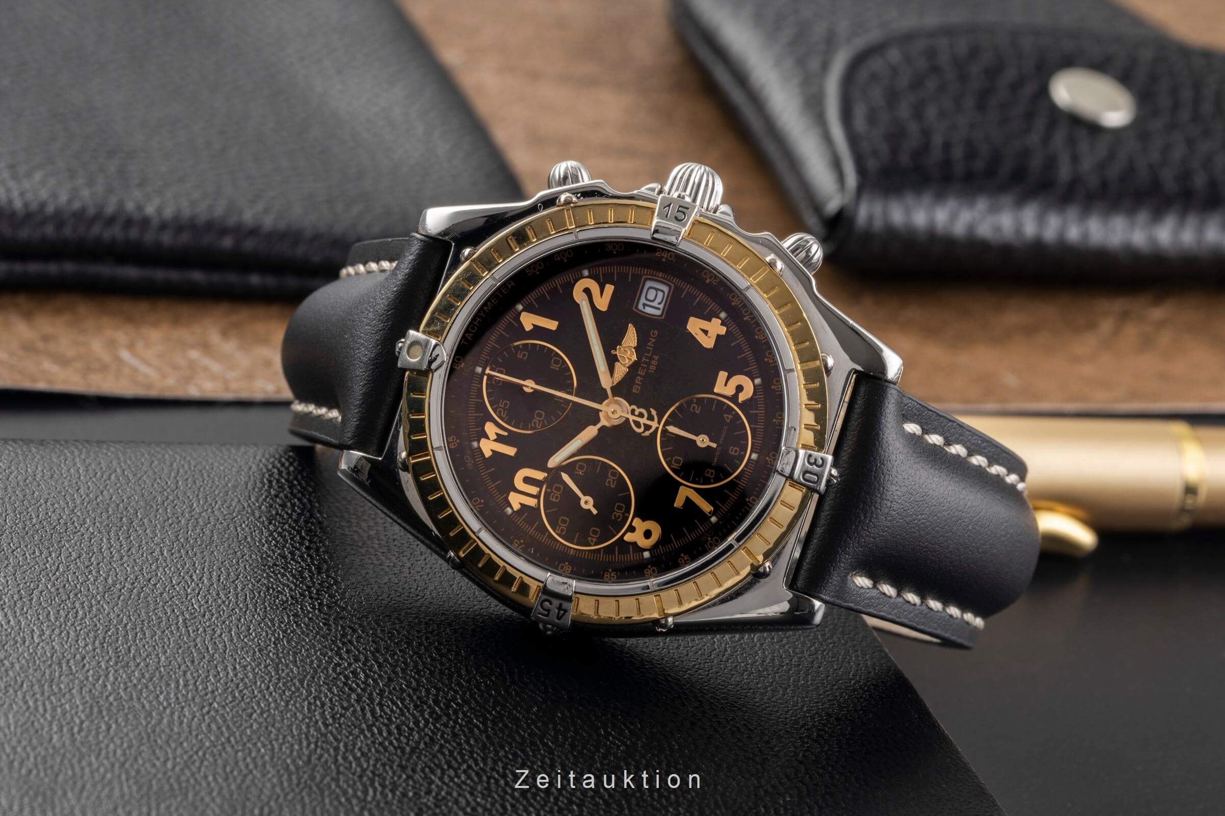 Breitling Chronomat chronograph steel / gold automatic Kal. B13 Ref. D13050.1  | Zeitauktion