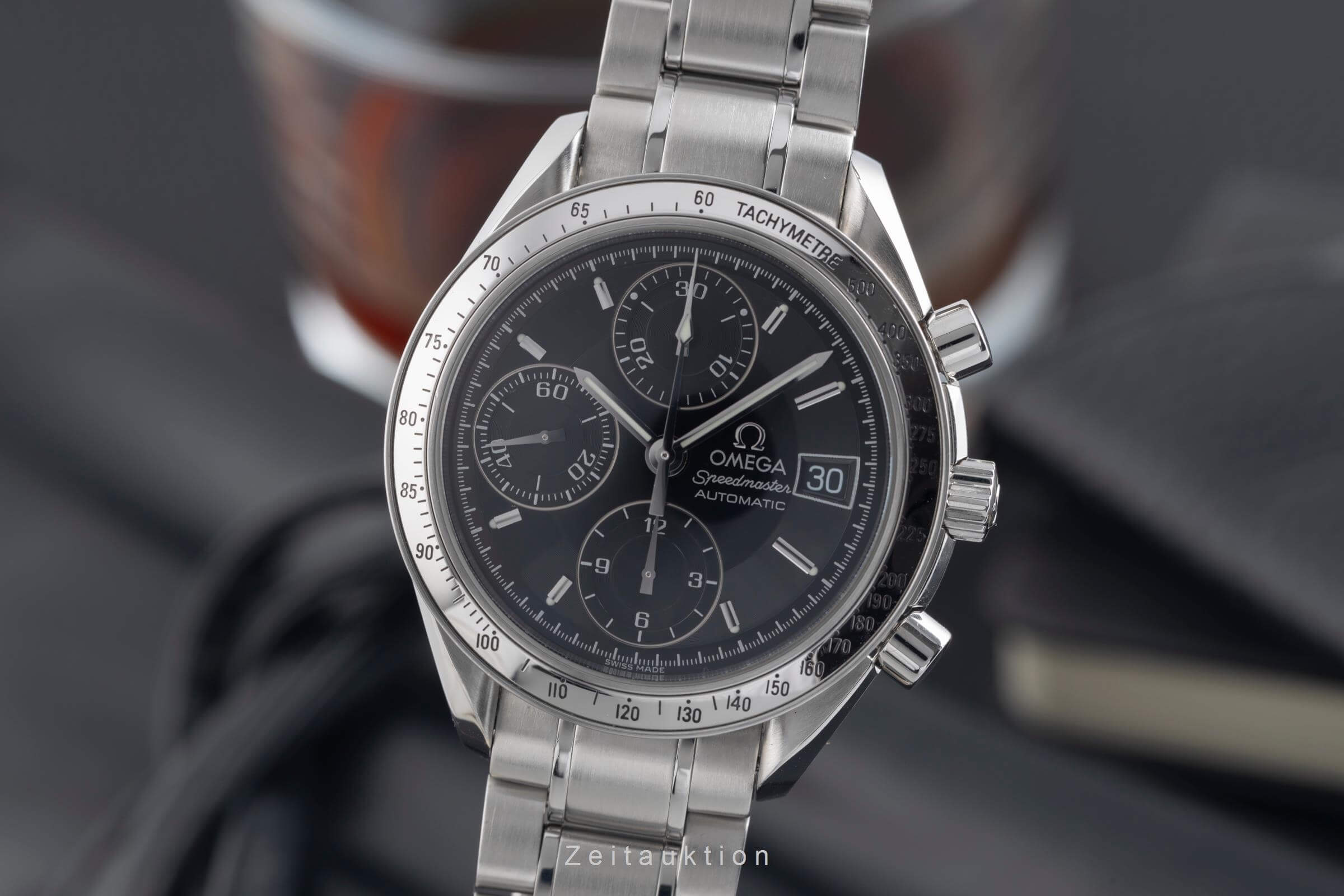 Omega Speedmaster Date chronograph steel automatic Kal. 1164 Ref. 3513.50.00  | Zeitauktion