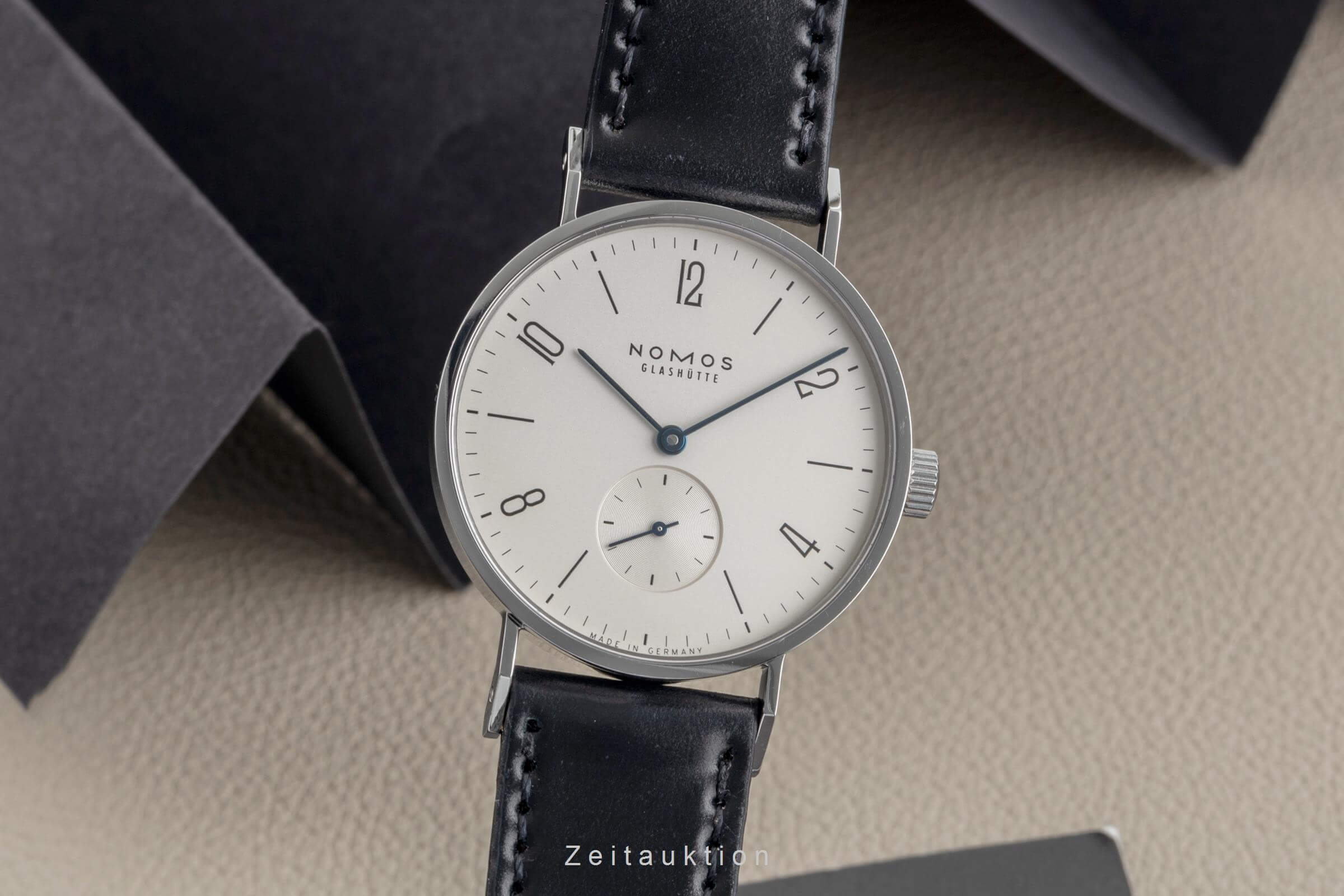 Nomos Tangente Stahl Handaufzug Kal. Alpha Ref. 101  | Zeitauktion