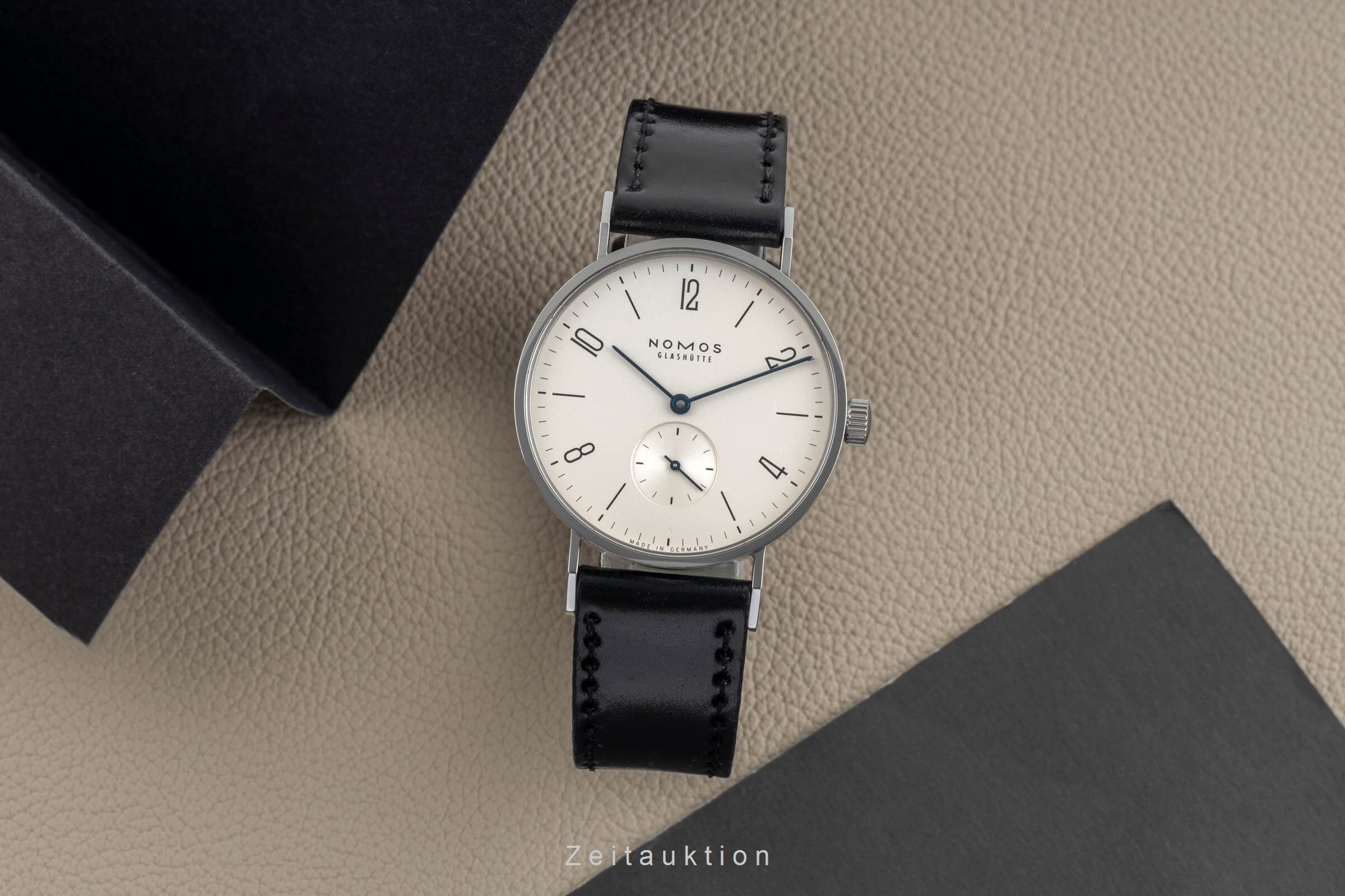 Nomos Tangente Stahl Handaufzug Kal. Alpha Ref. 101  | Zeitauktion