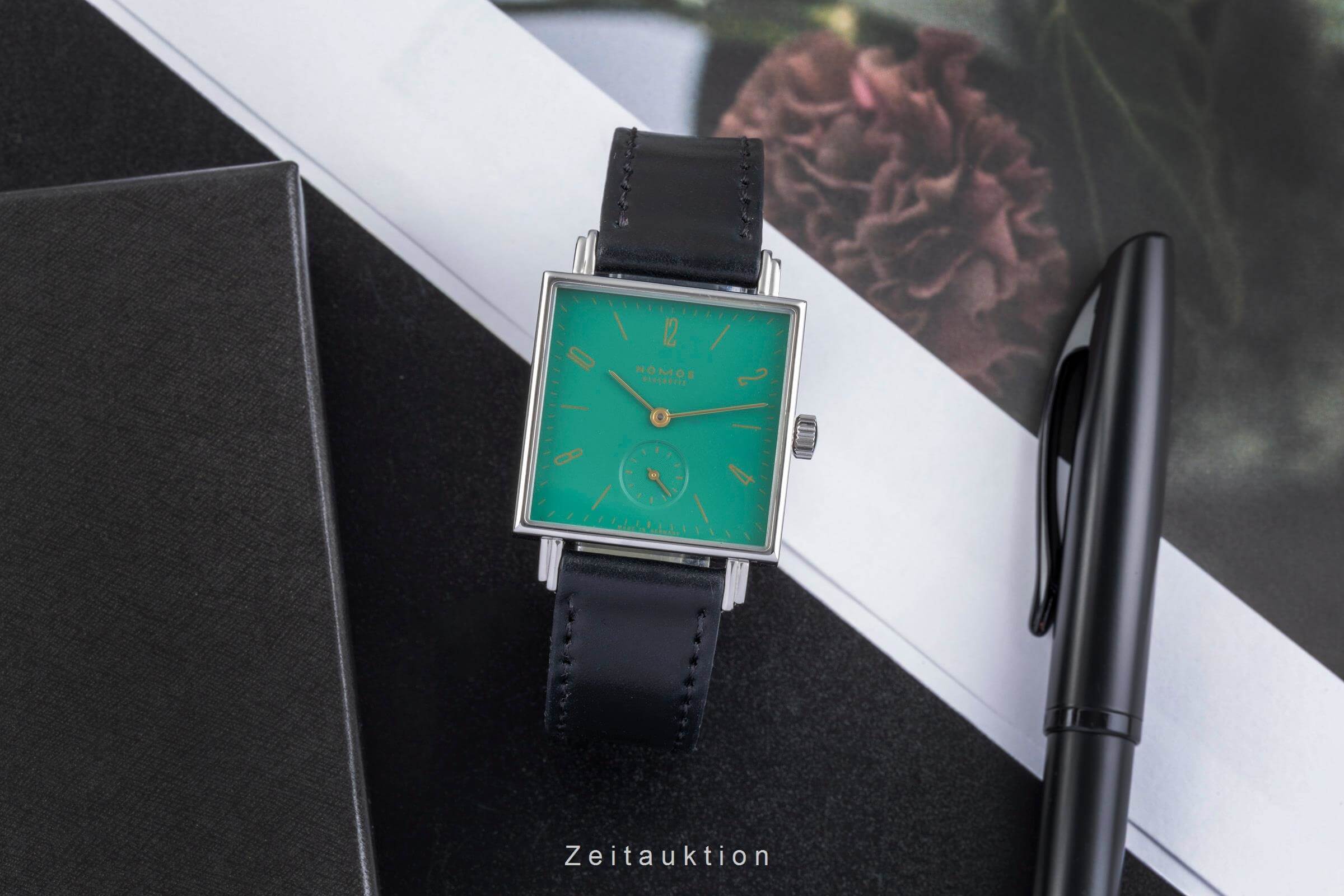 Nomos Tetra Stahl Handaufzug Kal. Alpha Ref. 489  | Zeitauktion
