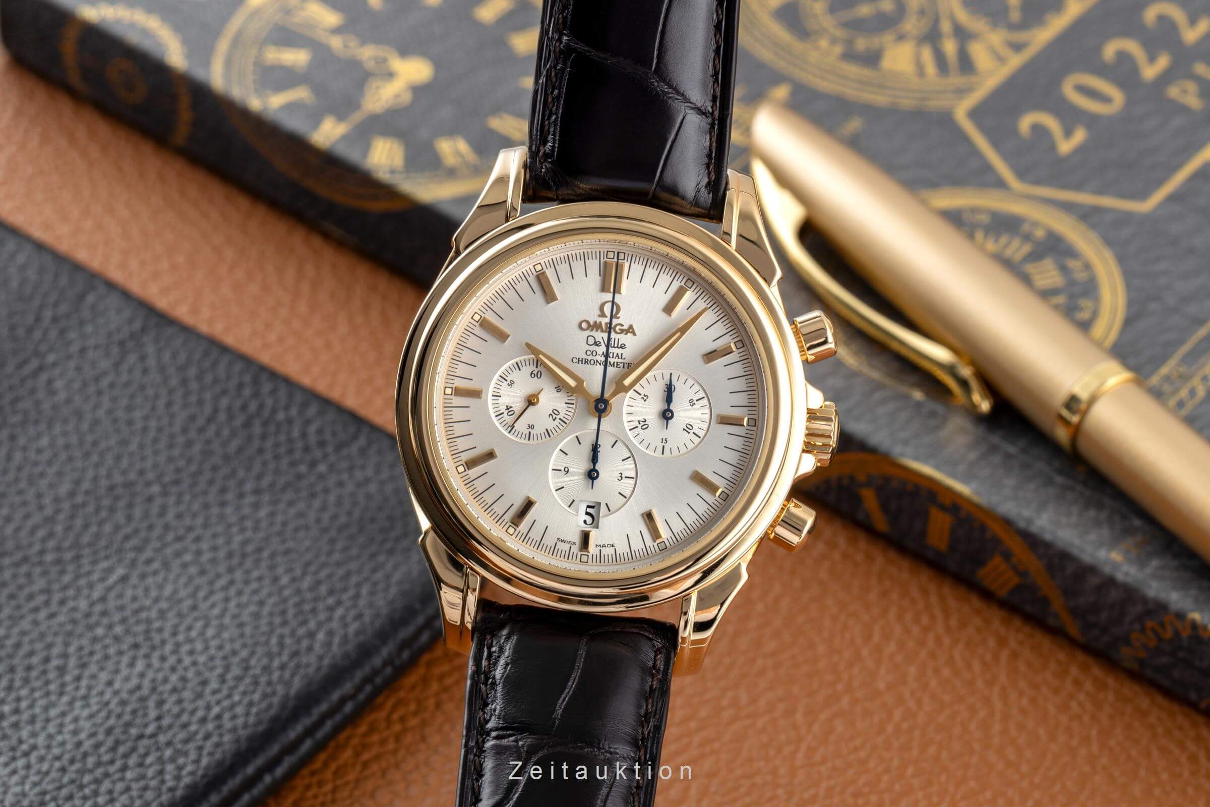 Omega De Ville chronograph 18 ct gold automatic Kal. 3313A Ref. 4641.30.32  | Zeitauktion