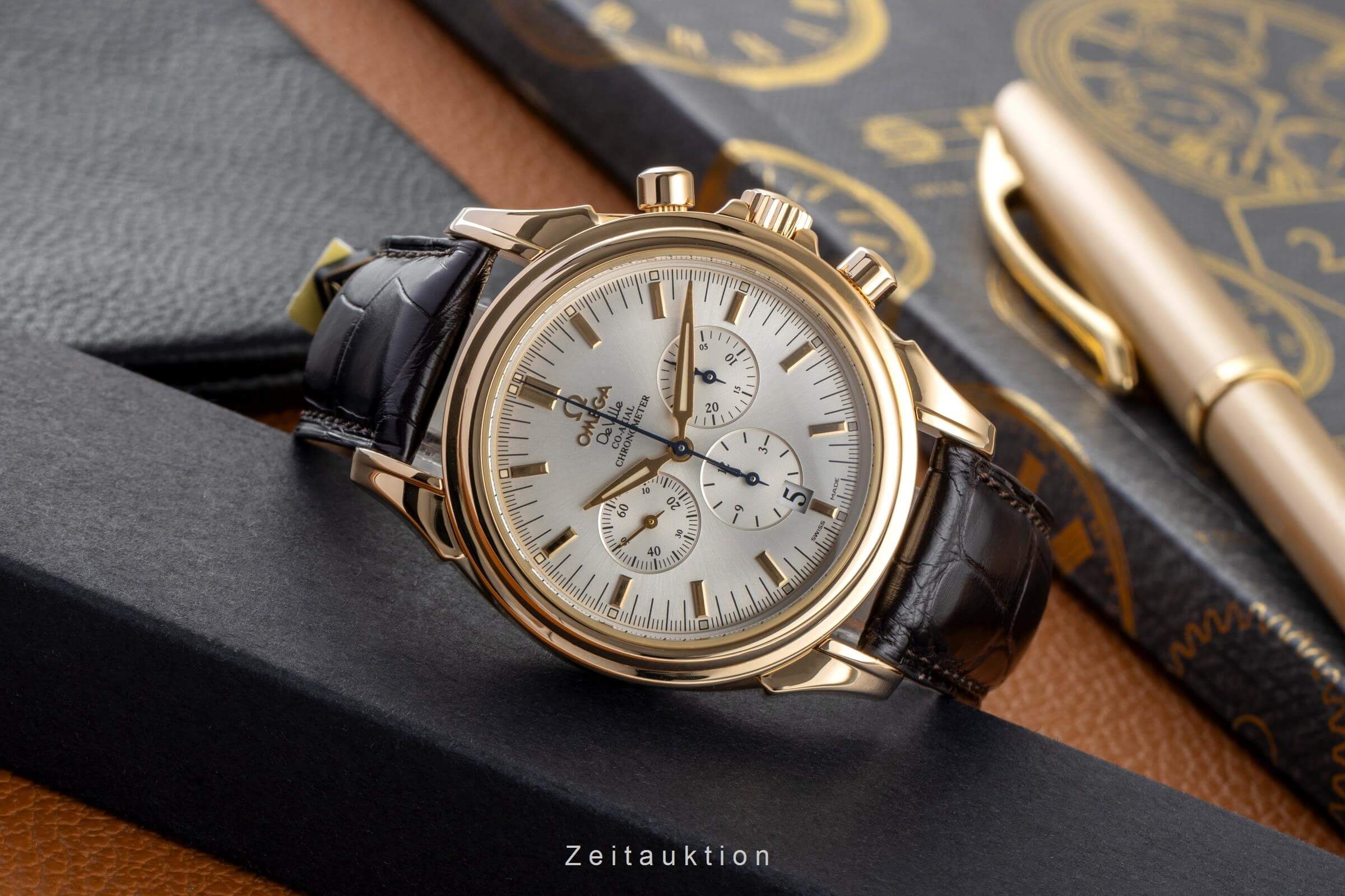 Omega De Ville chronograph 18 ct gold automatic Kal. 3313A Ref. 4641.30.32  | Zeitauktion