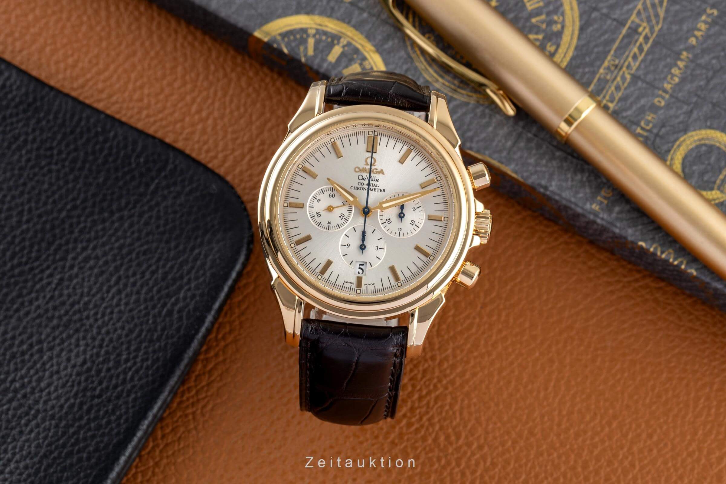 Omega De Ville chronograph 18 ct gold automatic Kal. 3313A Ref. 4641.30.32  | Zeitauktion